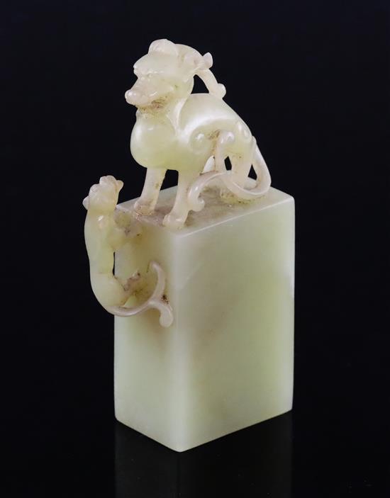 A Chinese greenish-yellow jade seal, 19th/20th century, H. 7.5cm